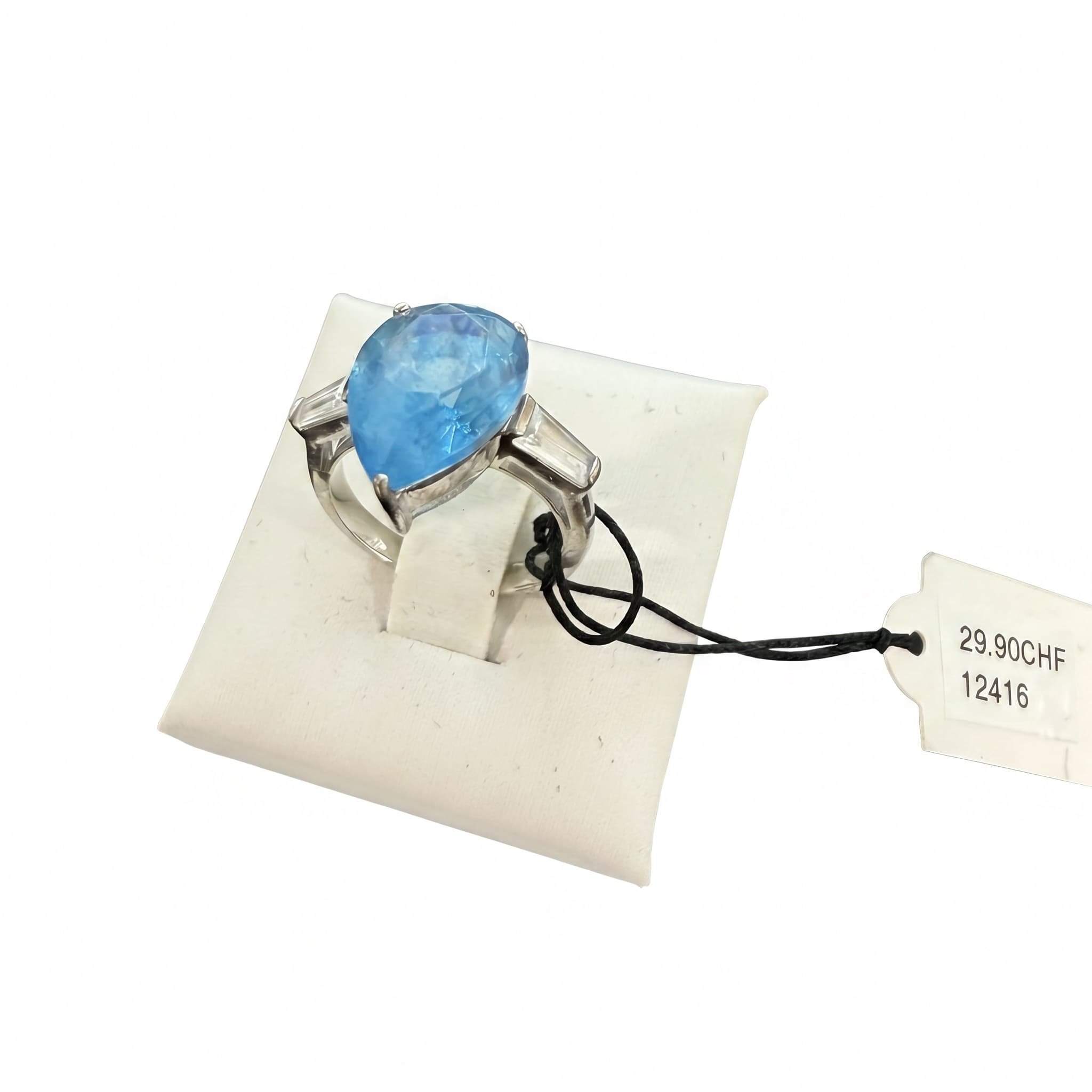 Bague pierre bleue goutte épaules baguettes argentée
