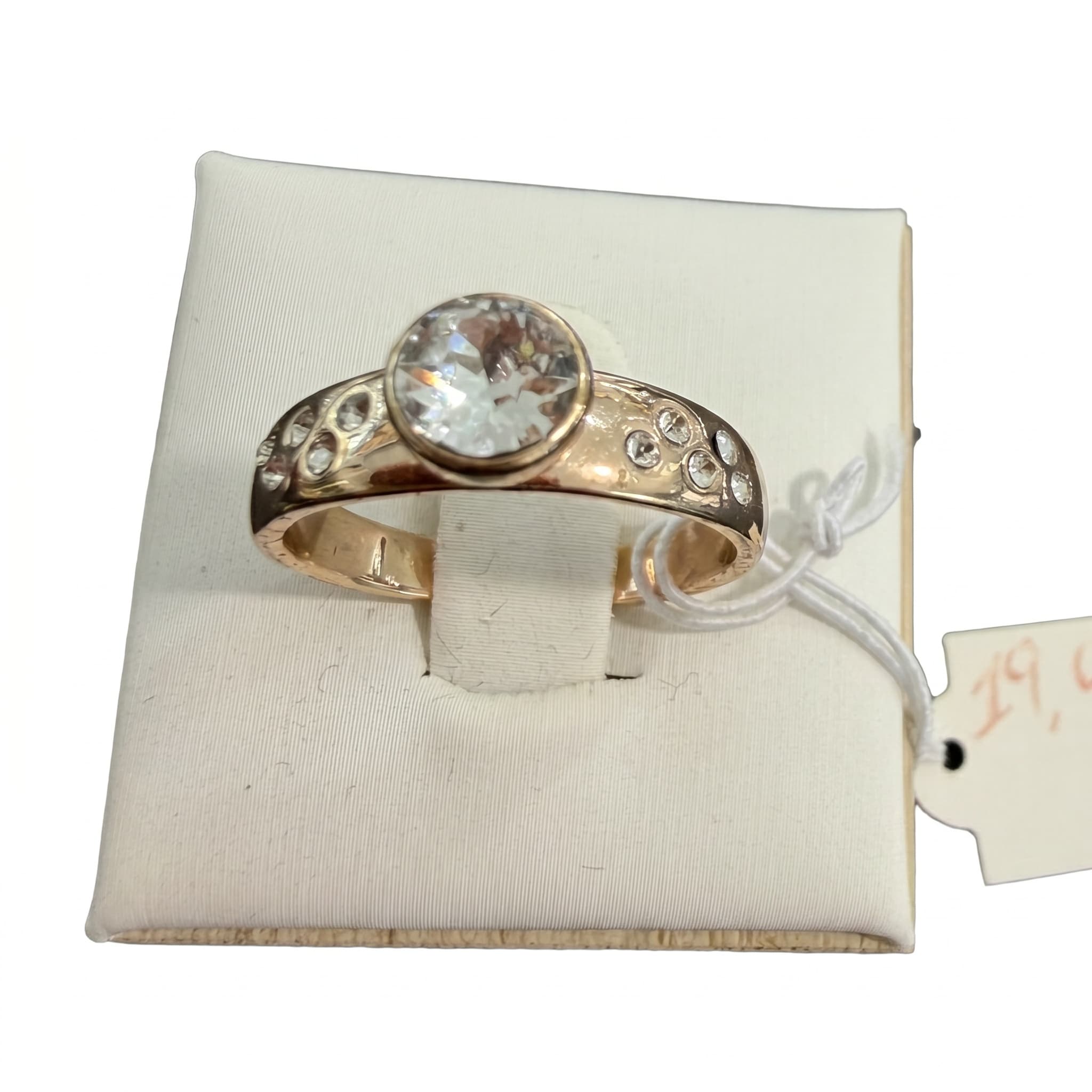 Bague solitaire zircon serti clos doré rose